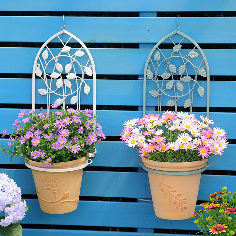 hanging wrought iron plant holders Hanging Rack Balcony Basket Holder Wrought Iron Plant Stand Arch Furni – Fujian Yirong Crafts Co., Ltd